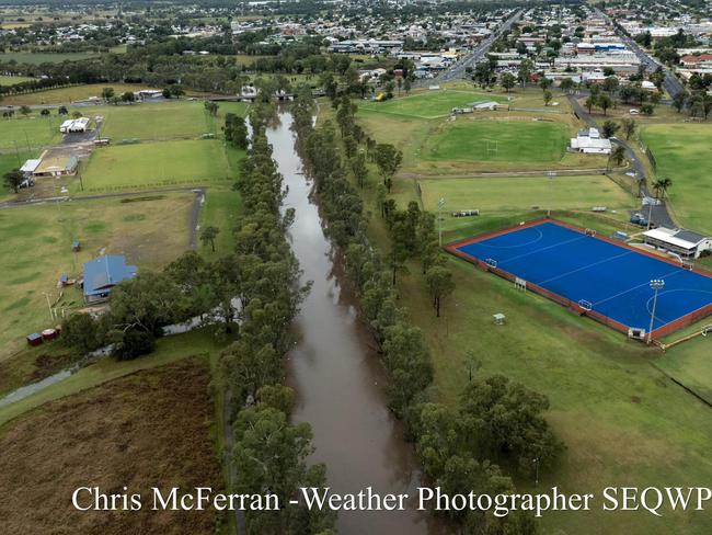 The Condamine River at Warwick has a steady flow as flood water makes its way down from Killarney. Photo: Facebook/Chris McFerran Photography