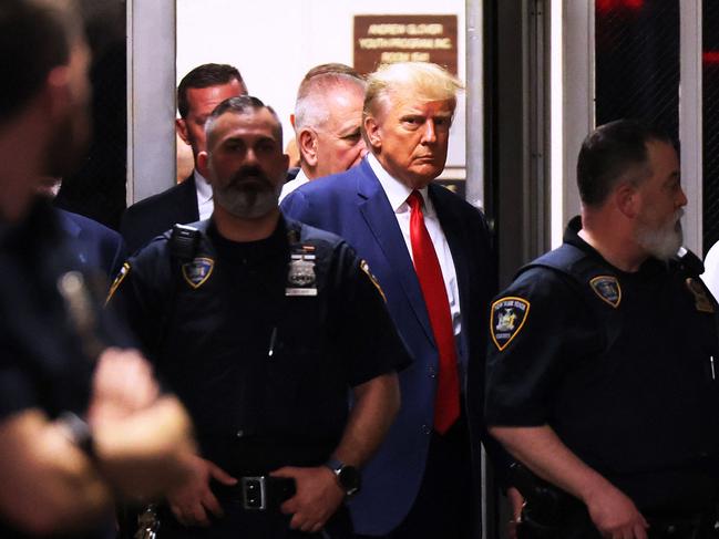 NEW YORK, NEW YORK - APRIL 04: (EDITOR'S NOTE: Alternate crop) Former U.S. President Donald Trump arrives for his arraignment at Manhattan Criminal Court on April 04, 2023 in New York City. With the indictment, Trump becomes the first former U.S. president in history to be charged with a criminal offense.   Michael M. Santiago/Getty Images/AFP (Photo by Michael M. Santiago / GETTY IMAGES NORTH AMERICA / Getty Images via AFP)