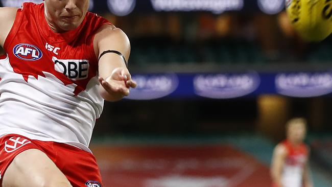 SYDNEY, AUSTRALIA - JUNE 14: Lewis Taylor of the Swans kicks a goal during the round 2 AFL match between the Sydney Swans and the Essendon Bombers at Sydney Cricket Ground on June 14, 2020 in Sydney, Australia. (Photo by Ryan Pierse/Getty Images)