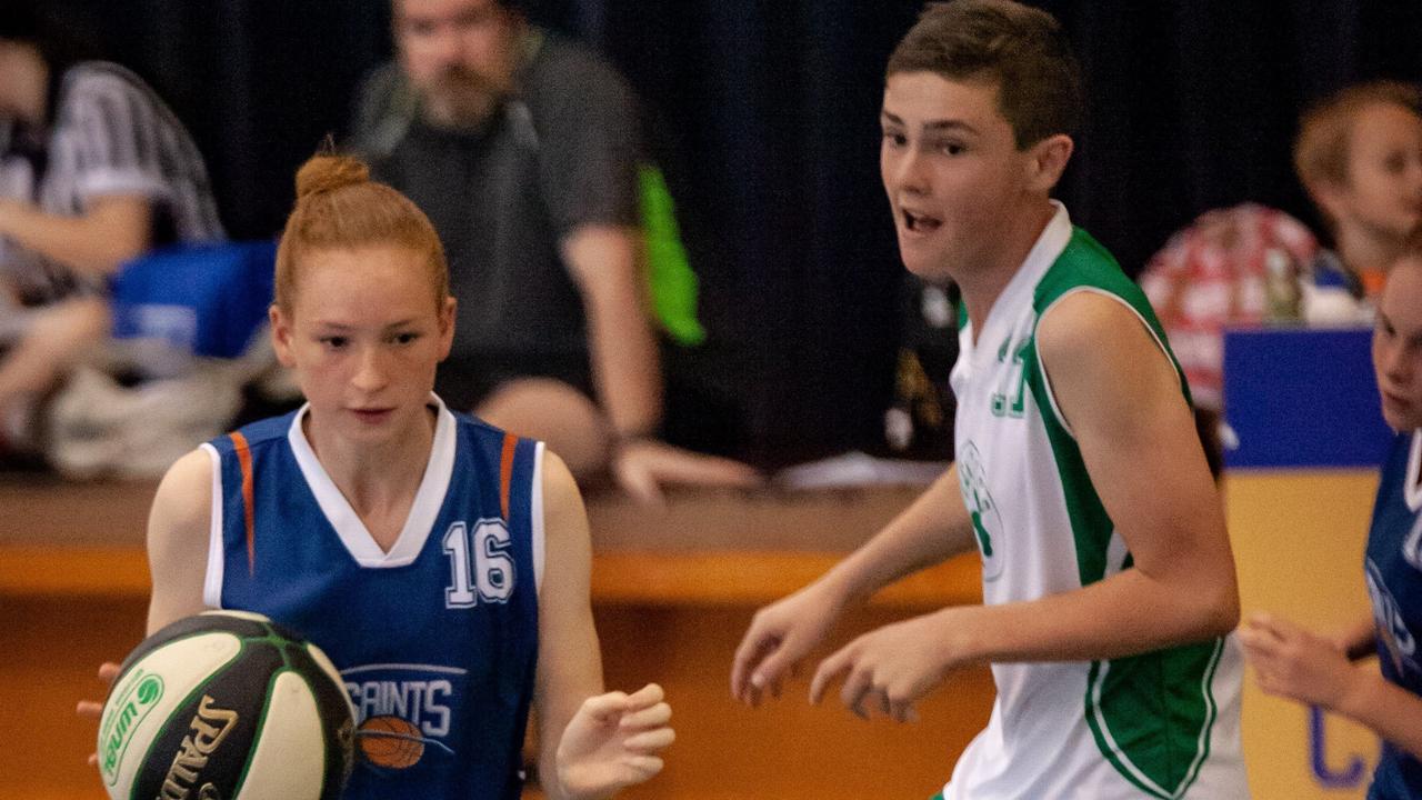 Gympie Basketball – Ashlyn Steele blows past defender, Joshua Devereaux.