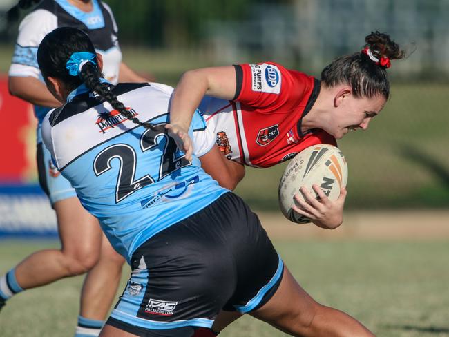 Genna Stiles ( Ball) in the NRL NT Women's round 10 match between Northern Sharks and Litchfield Bears. Picture: Glenn Campbell