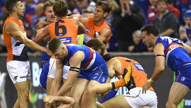 Players react after the Toby Greene kick to the face. Picture: Getty Images