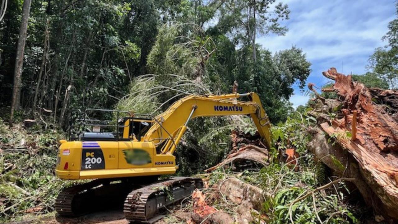 Work crews at the Palmerston Highway clear the roadway of vegetation and rock following major landslides in the wake of Ex Cyclone Jasper. Picture: Transport and Main Roads