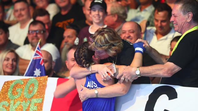 Nicolson with family after winning gold. Picture: Chris Hyde/Getty Images