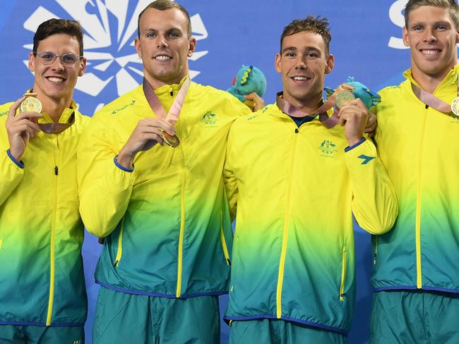 Gold medalists Mitch Larkin, Jake Packard, Grant Irvine and Kyle Chalmers of Australia