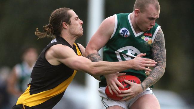 Jordan Treloar (left) in action for Heidelberg. Picture: Stuart Milligan