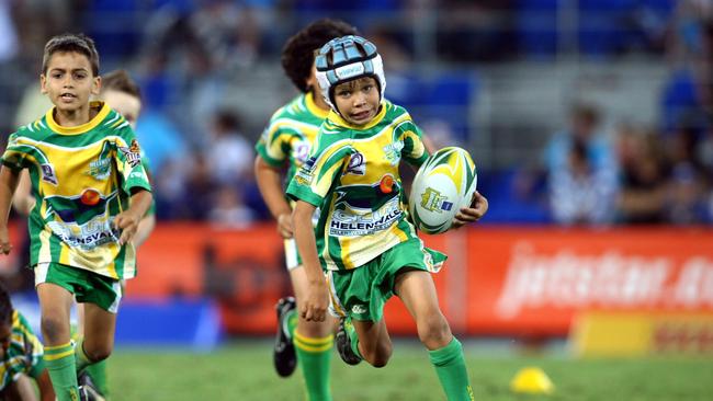 Gold Coast Titans Vs Canterbury Bulldogs from Skilled Park, Robina - Jayden Campbell, son of Titans Preston Campbell, playing at half time in 2009.