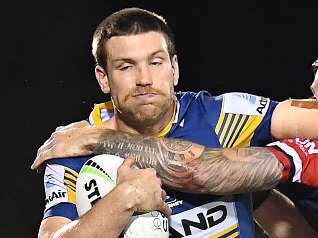 MACKAY, AUSTRALIA - JULY 29: Tom Opacic of the Eels takes on Adam Keighran of the Roosters during the round 20 NRL match between the Sydney Roosters and the Parramatta Eels at BB Print Stadium, on July 29, 2021, in Mackay, Australia. (Photo by Albert Perez/Getty Images)