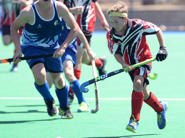 Jai Cass playing for Rockhampton in the Queensland U15 Boys Hockey Championships at Kalka Shades.