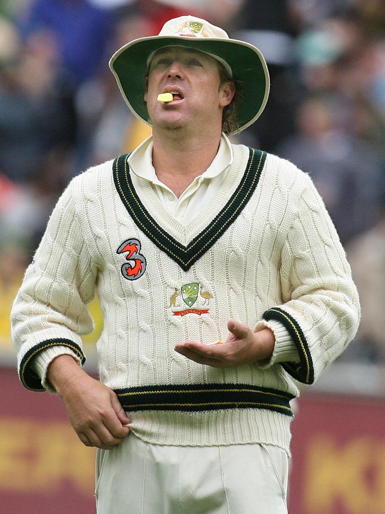 Warnie tucks into a lolly banana during an Ashes Test.