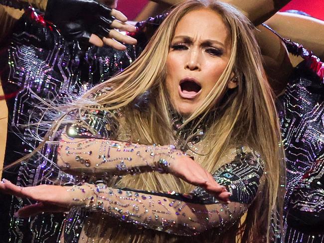 LAS VEGAS, NEVADA - MAY 26: (EDITORIAL USE ONLY) Jennifer Lopez (C) performs onstage during the 2025 American Music Awards at BleauLive Theater at Fontainebleau Las Vegas on May 26, 2025 in Las Vegas, Nevada. (Photo by Ethan Miller/Getty Images)