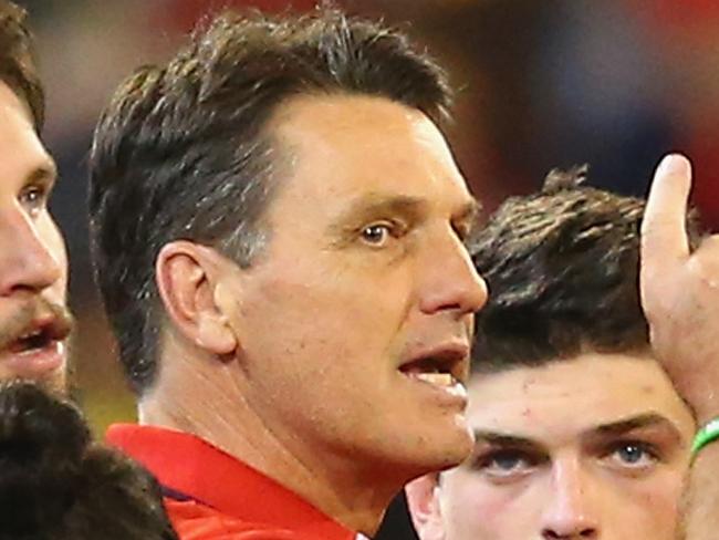 MELBOURNE, AUSTRALIA - APRIL 24: Paul Roos the coach of the Demons talks to his players during the round five AFL match between the Melbourne Demons and the Richmond Tigers at Melbourne Cricket Ground on April 24, 2016 in Melbourne, Australia. (Photo by Quinn Rooney/Getty Images)