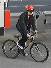 A cyclist police would like to speak to in relation to a wallet theft.