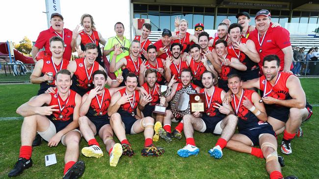 Flagstaff Hill players and officials celebrate the club’s third premiership in succession last year. Picture: AAP/Mark Brake