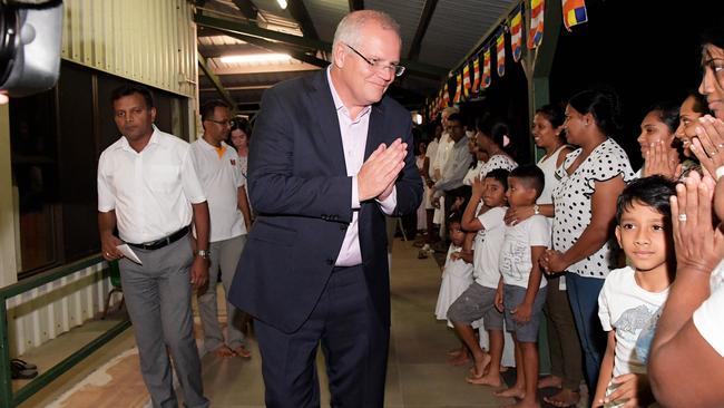 PM Scott Morrison greets people at the Leanyer Buddhist temple in Darwin. Picture: Keri Megelus