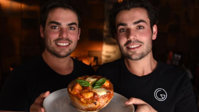 Ali and James Carney with a bread gnocchi bowl at Gemelli in Broadbeach. Photo: Steve Holland