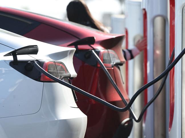 PASADENA, CALIFORNIA - SEPTEMBER 23: Tesla electric vehicles (EVs) recharge at a Tesla Supercharger station on September 23, 2024 in Pasadena, California. The California Air Resources Board announced that Californiaâs carbon dioxide emissions dropped 2.4 percent in 2022, even as the economy rebounded from the COVID-19 pandemic, primarily due to electric vehicle use and cleaner fuels.   Mario Tama/Getty Images/AFP (Photo by MARIO TAMA / GETTY IMAGES NORTH AMERICA / Getty Images via AFP)