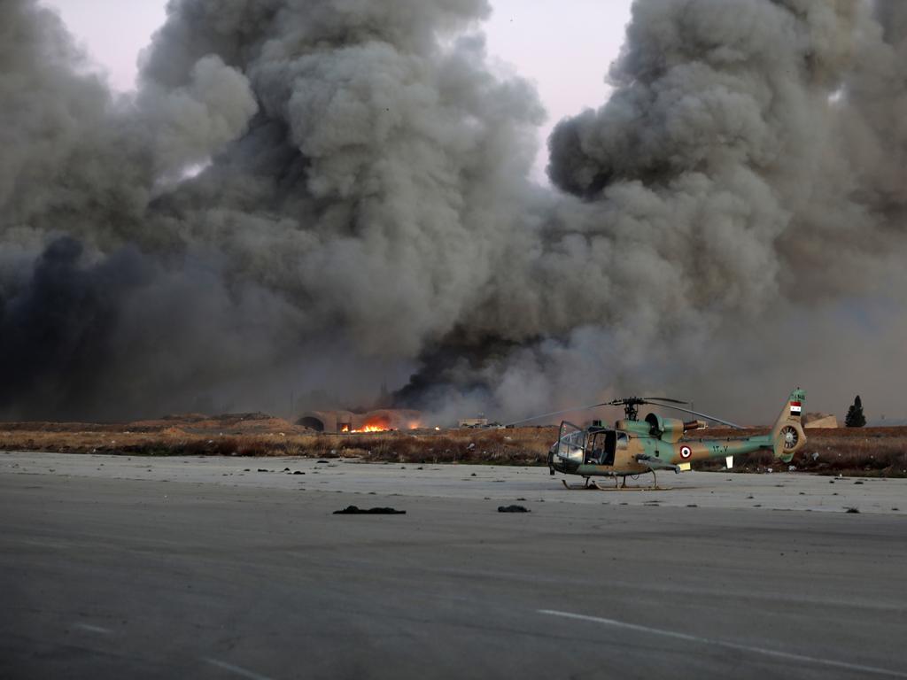 Smoke rises in the aftermath of suspected IDF strikes near Mezzeh Air Base. Picture: Getty