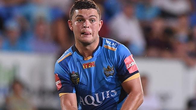 GOLD COAST, QUEENSLAND - APRIL 01: Ash Taylor of the Titans kicks the ball during the round five NRL match between the Gold Coast Titans and the Brisbane Broncos at Cbus Super Stadium on April 1, 2016 in Gold Coast, Australia. (Photo by Matt Roberts/Getty Images)