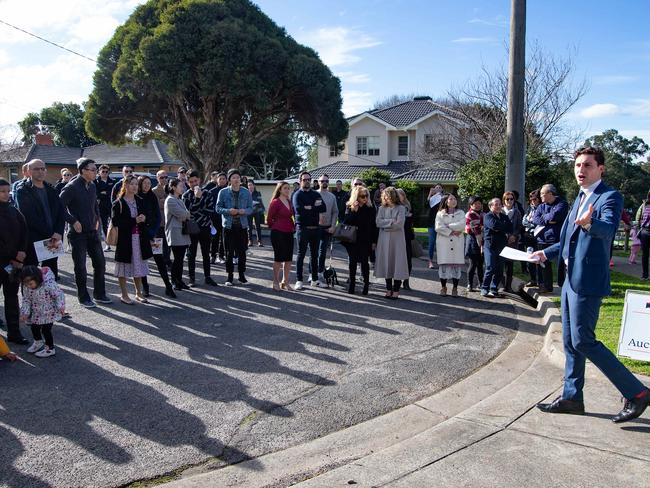 Auctioneer, Todd Lucas, Barry Plant in action during the auction of 39 Ironbark Drive, Templestowe Lower. A large crowd attended with 5 bidders, the property ended up going to a family of 5 who made the winning bid of 1.35 million. Picture: Sarah Matray