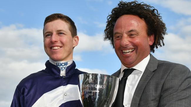 Jockey Damian Lane and trainer Simon Zahra after Aristia won the VRC Oaks.