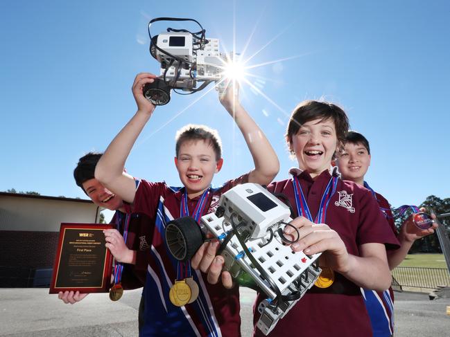 Ashgrove State School year 6 studentsSebastian Cumplido-Richards, Luke Jacobsen, David Plater, and Ethan White, winners of the Australian open World Educational Robot competition, Ashgrove. Photographer: Liam Kidston.