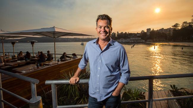 Dave Evans, co-owner of Hugos Manly, outside his restaurant on Manly Wharf. (AAP Image / Julian Andrews).