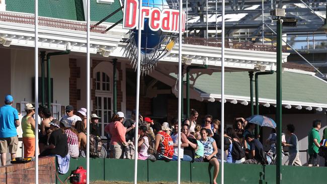 Crowds out the front of the park following the tragedy. Photo: Regi Varghese