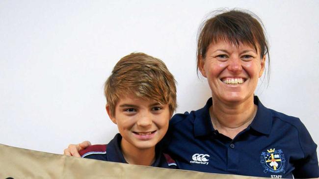 William Anderson with his teacher Julie Peters who helped coordinate the care packages program for ADF members. Picture: Contributed