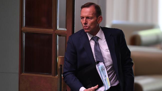 It’s just a step to the right, and bend your knees in time. Tony Abbott does the time warp again. Picture: AAP
