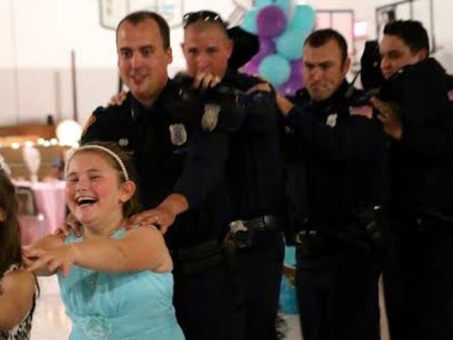 Dancing the night away! Jewel celebrated the Father-Daughter dance with six of her dad’s colleagues Photo: Memphis Police Department.