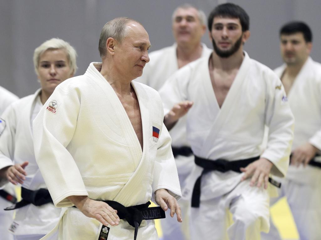 Putin attends a training session with the Russian national judo team during a break at the Sochi summit with Lukashenko. Picture: AP