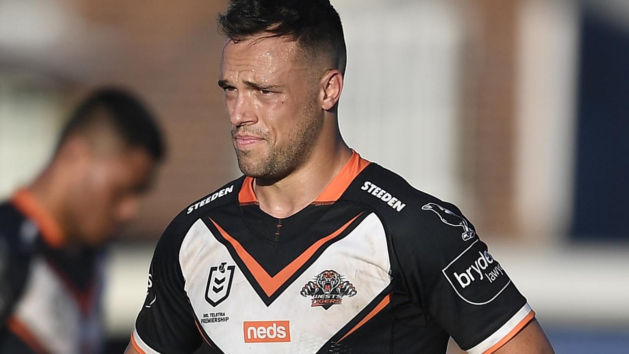 ROCKHAMPTON, AUSTRALIA - AUGUST 21: Luke Brooks of the Tigers looks dejected after losing the round 23 NRL match between the Wests Tigers and the Cronulla Sharks at Browne Park, on August 21, 2021, in Rockhampton, Australia. (Photo by Ian Hitchcock/Getty Images)