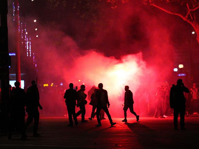 PARIS, FRANCE - JULY 7: Demonstrators clash with police during a protest following the legislative election results on July 7, 2024 in Paris, France. The National Rally party was expected to have a strong showing in the second round of France's parliamentary election, which was called by the French president last month after his party performed poorly in the European election. (Photo by Carl Court/Getty Images)