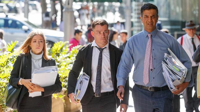 Tom Starling (centre0 and his lawyer Samar Singh-Panwar arriving at Downing Centre in December 2022. Picture: NCA NewsWire / David Swift