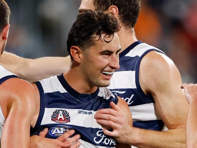 GEELONG, AUSTRALIA - APRIL 22: Sam Simpson of the Cats celebrates a goal with teammates during the 2023 AFL Round 06 match between the Geelong Cats and the Sydney Swans at GMHBA Stadium on April 22, 2023 in Geelong, Australia. (Photo by Dylan Burns/AFL Photos via Getty Images)