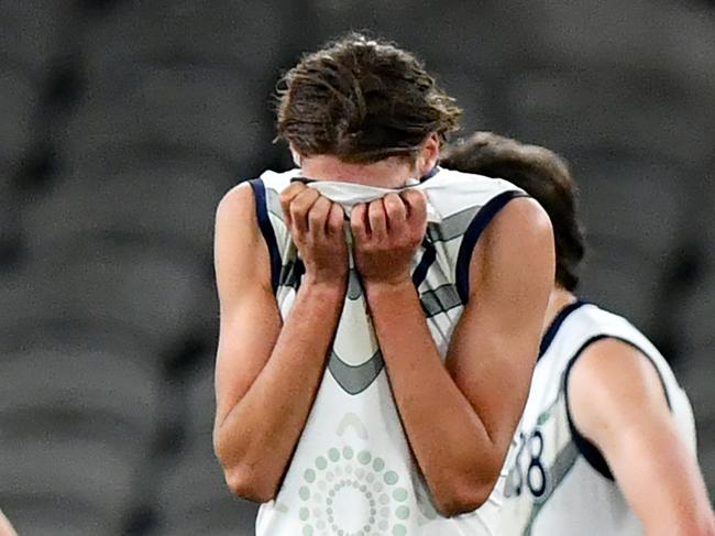 MELBOURNE, AUSTRALIA - JULY 14: Victoria Country look dejected after losing the 2024 Marsh AFL Championships U18 Boys match between Victoria Metro and Victoria Country at Marvel Stadium on July 14, 2024 in Melbourne, Australia. (Photo by Josh Chadwick/AFL Photos)