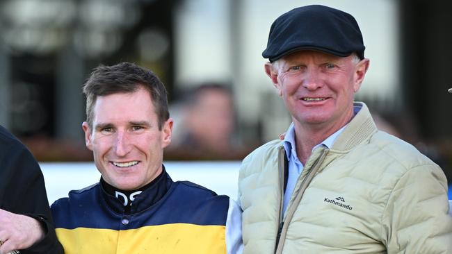 Jockey Daniel Stackhouse (left) and trainer Phillip Stokes celebrate Amade’s Sandown Cup success. Picture: Vince Caligiuri / Getty Images