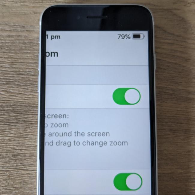 iPhones have a zoom function allowing you to focus on text and images.