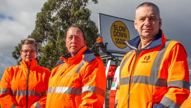 President of the Traffic Management Association of Australia Nicole Willing, roadside worker Mel Sutton, and Civil Contractors Federation CEO Andrew Winch at the launch of a new road safety campaign, Your Speed is Our Safety. Picture: Linda Higginson