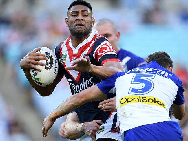 Daniel Tupou of the Roosters is tackled by Kerrod Holland of the Bulldogs during the Round 11 NRL match between the Canterbury-Bankstown Bulldogs and the Sydney Roosters at ANZ Stadium in Sydney, Sunday, May 21, 2017. (AAP Image/Dan Himbrechts) NO ARCHIVING, EDITORIAL USE ONLY