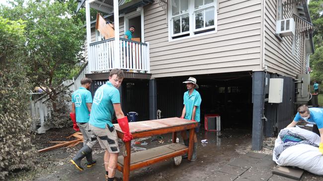Cleaning up in Vincent St, Auchenflower. Picture: Annette Dew