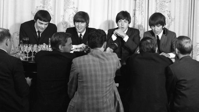 The Beatles in Adelaide in 1964, (from left) drummer Jimmie Nicol, sitting in for an ill Ringo Starr, John Lennon, Paul McCartney and George Harrison. McCartney said there was more to the band than drama. Picture: Jeff Hochberg/Getty Images