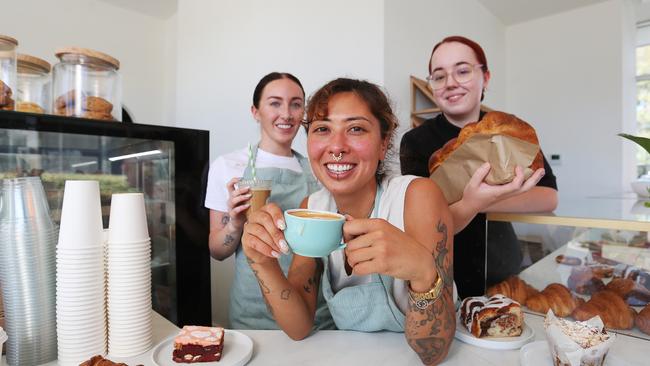 Elleese Aoki with team members Emily Bibby and Kendra Gerusel. Picture: Alan Barber