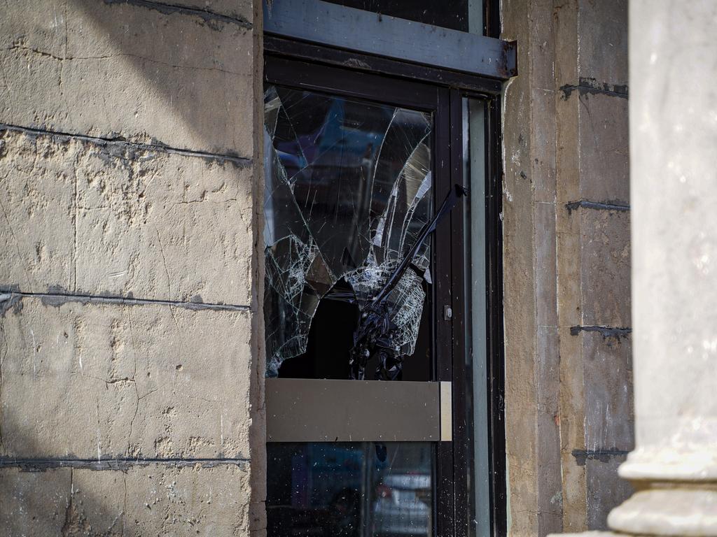 Vandals have smashed two glass windows at the old Commonwealth Bank building. Picture: Heidi Petith