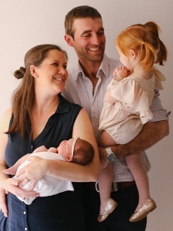 Jen McCutcheon with her late husband Andrew and their daughters, Annie and Evie.