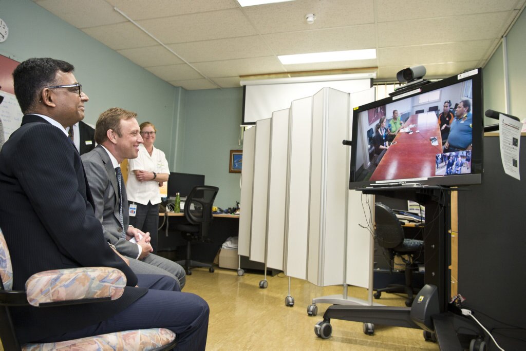 Queensland Health Minister Steven Miles (right) and consultant nephrologist Dr Sree Krishna Venuthurupalli demonstrate the telehealth technology used by the specialist renal team to deliver services to Cherbourg, Friday, April 27, 2018. Picture: Kevin Farmer