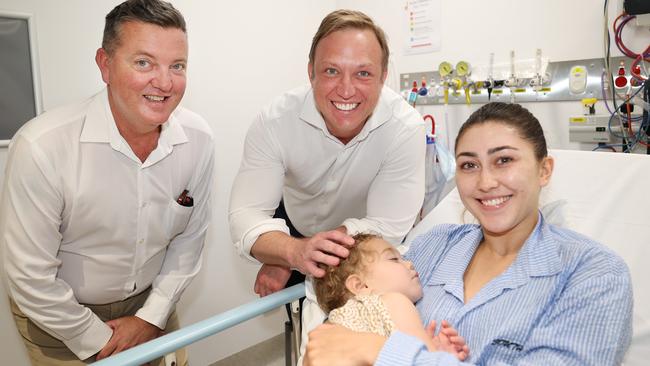 Premier Steven Miles with Robert Skelton at the Nambour Hospital with Mereana Harrod and son Jai 20mnths old from Bli Bli .Pic Annette Dew office of the Premier