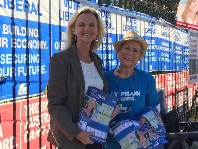 Liberal candidate for Dobell Jilly Pilon with volunteer Barbara Martin handing out how-to-vote flyers at Tuggerah Lakes Secondary College. Picture: Richard Noone