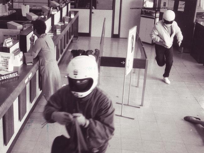 Two robbers at the Royal Children’s Hospital ANZ in 1987 might now be mistaken for Daft Punk or Top Gear fans.